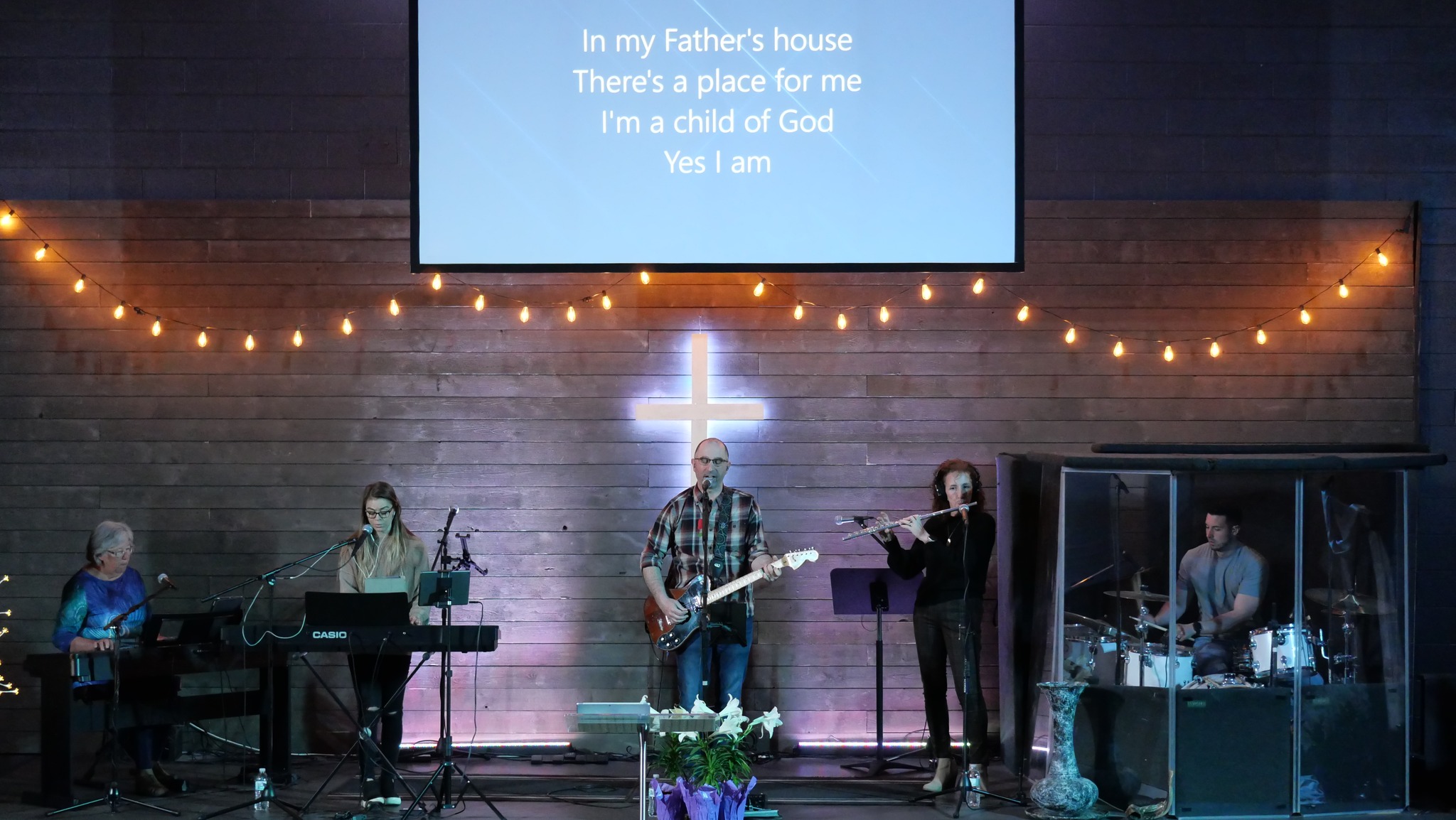 Worship service at Life of Faith Gospel Ministries in Brampton with live music and congregational prayer